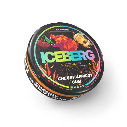 Front view of a circular tin of Iceberg Cherry Apricot Gum snus featuring colorful fruit graphics on a white background