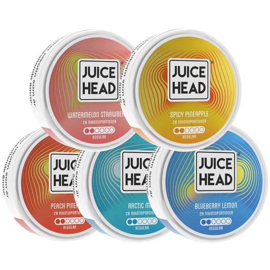 Packaging shot of Juice Head mix pack featuring five colorful containers with various fruit flavors.