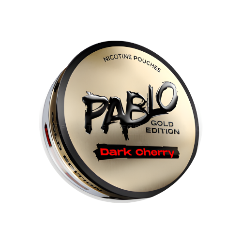 Detail close-up of a gold tin container with a round shape and screw top, featuring a black and red label design.