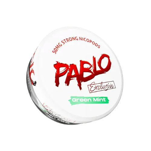 Detail close-up of the round white and red container for Pablo Exclusive Green Mint, showcasing graphic text and label des…