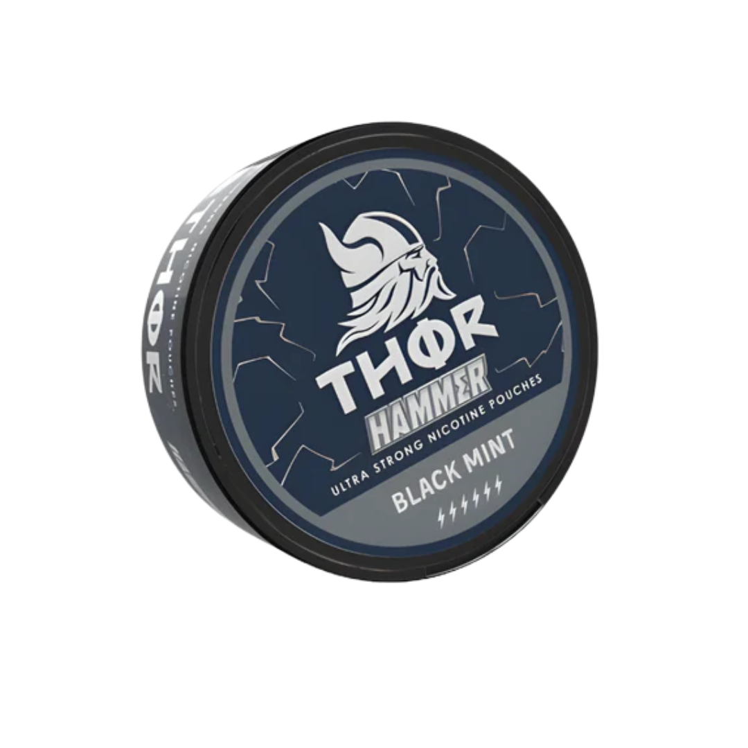 Detail close-up of the black circular tin with a matte finish and brand logo, showcasing its sleek design.