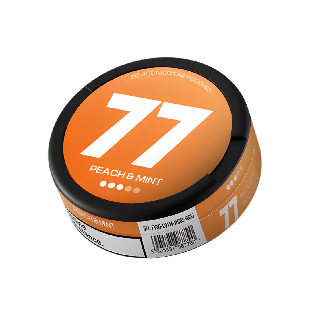 Detail close-up of the orange can featuring the number 77, with a black and white label on a white background.