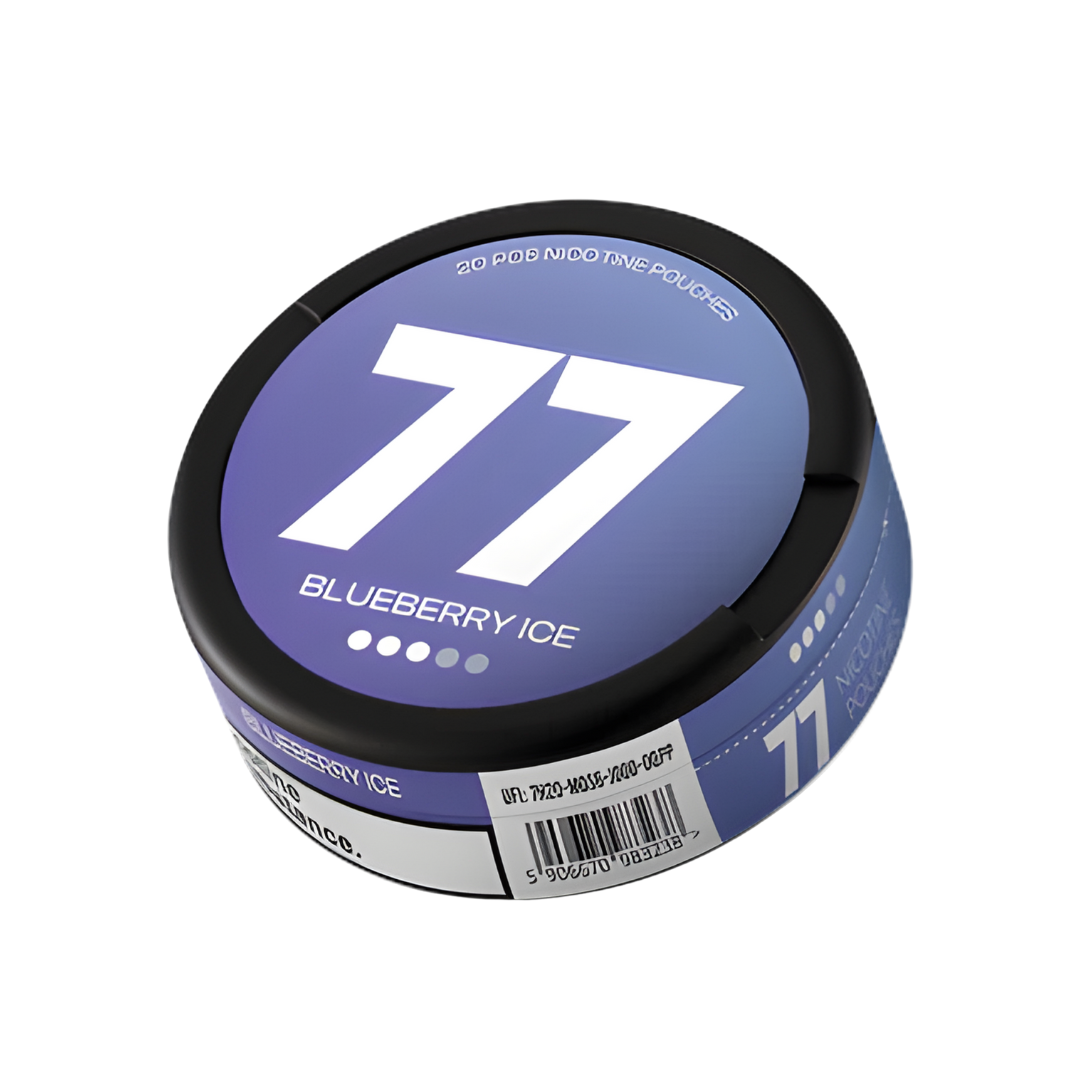 Detail close-up of a blue circular nicotine pouch container with a screw top and label.