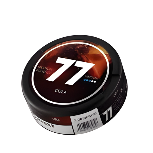 Detail close-up of the circular can of 77 Cola Medium featuring black, red, and white colors with large number 77 and labe…