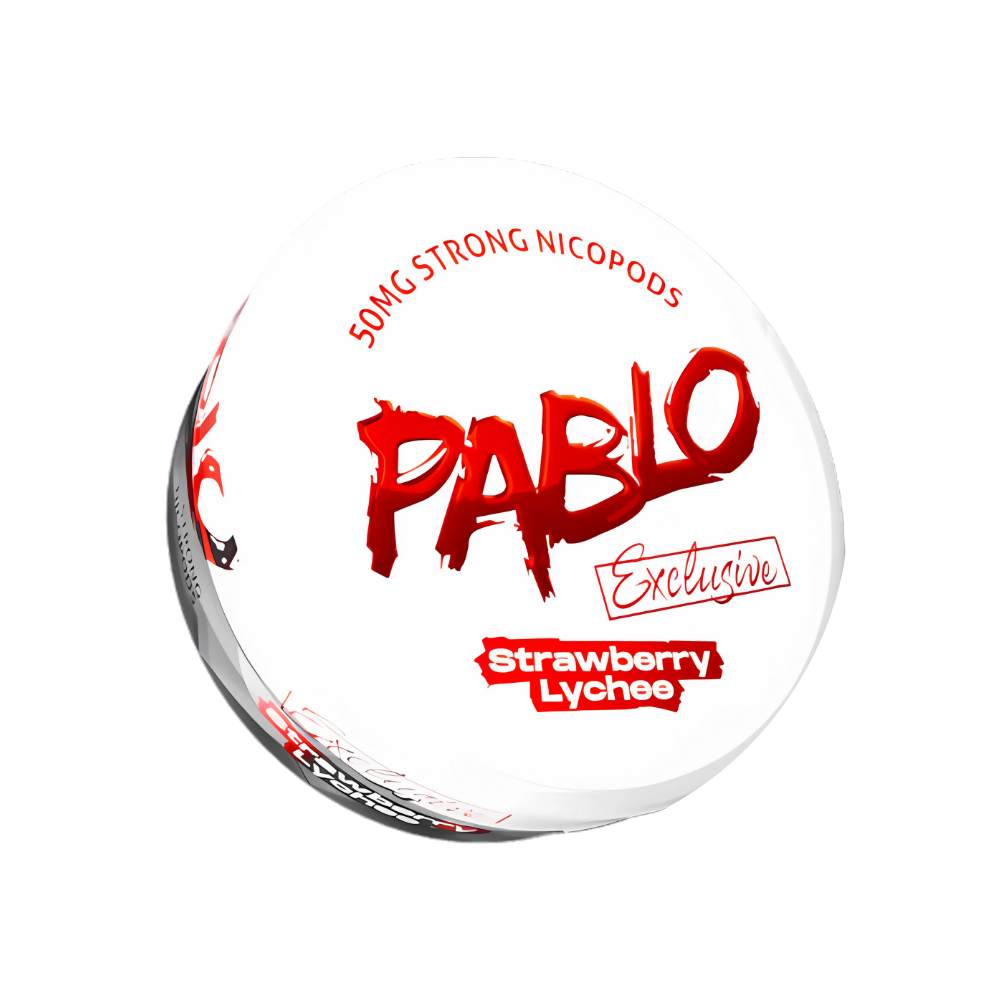 Detail close-up of the circular Pablo Exclusive Strawberry Lychee tin featuring graphic text in red and white.