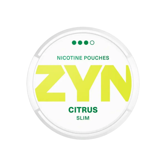 Detail close-up of Zyn Citrus Strong Slim pouch in a round container, showcasing vibrant yellow and white colors.